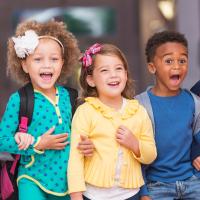 A group of laughing preschoolers